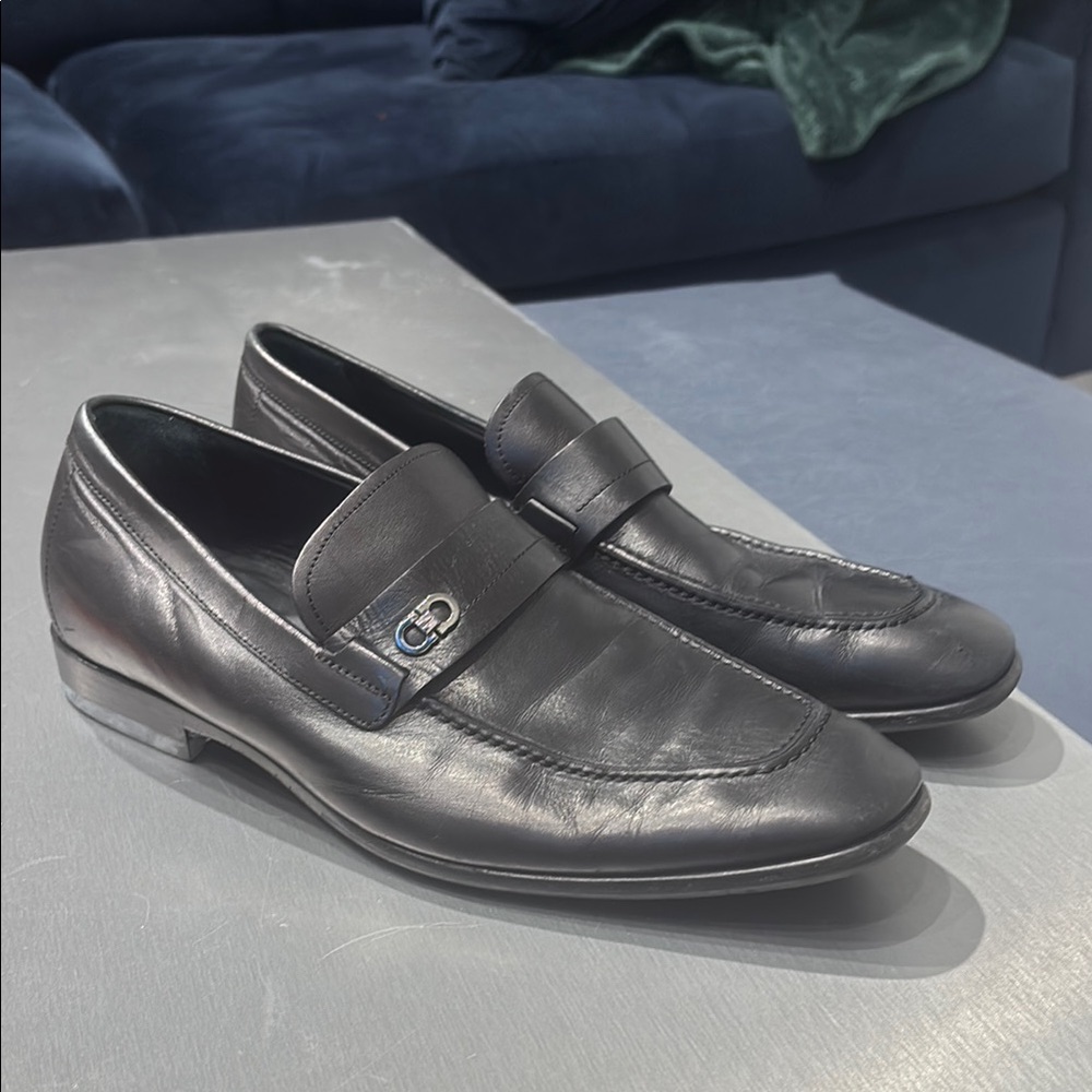 Sleek Black Leather Slip-On Loafers with Metal Accent
